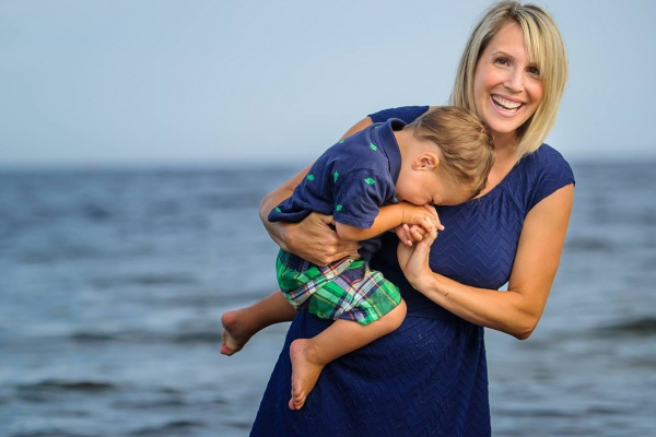 Shaina Falcone, Hubbards Streetscape committee member, laughing with son at the local beach.